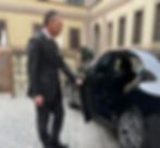 private-driver-opening-car-door